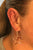 Fleck star hoop earrings