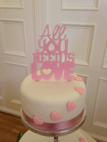 'All you need is love' wedding cake topper